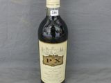 a bottle of wine that is sitting on a table