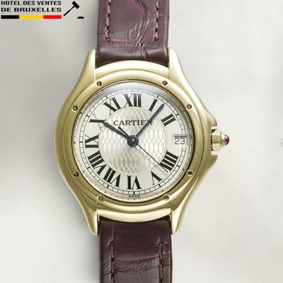 an image of a close up of a wrist watch with roman numerals