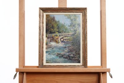 a picture of a painting on a easel with a painting on it