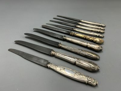 9 couteaux dont 1 en argent fourré 925/1000, poinçon Minerve 1er titre - Photo 1