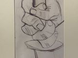 drawing of a person holding a hat on a table