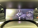 an image of a car dashboard with a digital display
