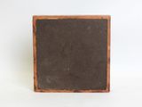 an old wooden box with a brown surface on a white background