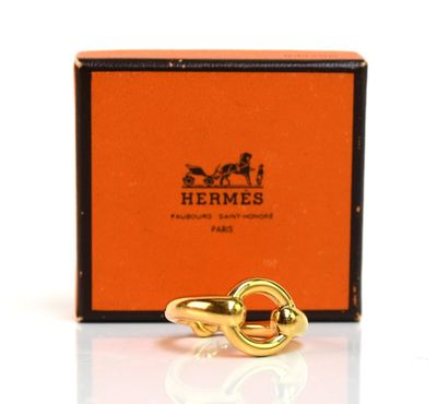 an image of a gold ring with a horse ' s head on it