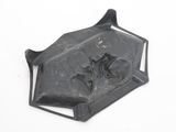 a metal object that is sitting on a white surface