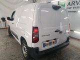 a white van that is parked in a garage