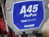 a blue and white sign on the back of a machine