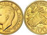 a gold coin with a picture of a man riding a horse