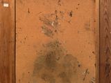 painting of a dog in a wooden frame with a brown background