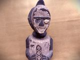 a statue of a man with a helmet and goggles on