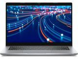 the laptop is open on a white background with a blurry background