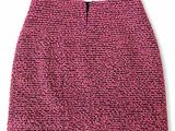 a pink skirt with a zipper on the side