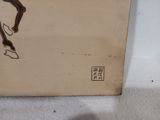a box with a drawing of a man on it