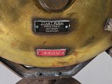 a very old looking machine that is sitting on a table