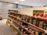 a grocery store filled with lots of food on the shelves