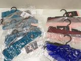 several umbrellas wrapped in plastic sitting on top of a table
