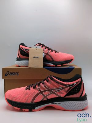asics gelevo running shoes in pink and black