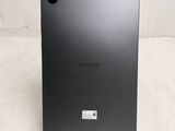a close up of the back of a black samsung tablet