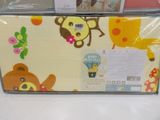 a picture of a baby crib bed with a teddy bear design on it