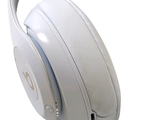 a pair of white headphones on a white background