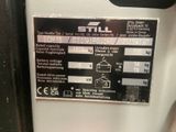 a sign on the side of a machine that says still