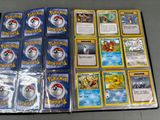 a lot of pokemon cards on the table