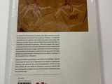 the back cover of a book with a picture of a cave scene