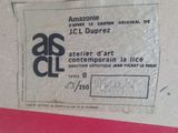 a label on a piece of paper on a wall