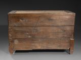 an old wooden chest with three drawers and one drawer open