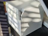 a white box sitting on top of a black counter