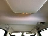 a view of the back of a car with the sunroof