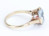 an image of a ring with a blue topaz stone