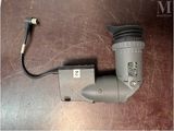 an image of a camera with a cord attached to it