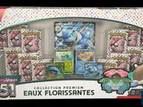 a box of pokemon cards with various items in it