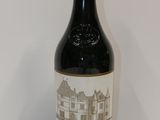 a bottle of wine that is sitting on a table