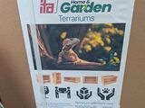 a cardboard box with a picture of a lizard on it