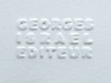 a close up of the words on a white surface