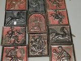 many different types of metal tiles on the table