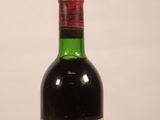 a bottle of wine that is sitting on a table