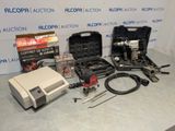 a lot of tools that are sitting on a table