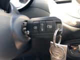 a key that is attached to a car ' s remote control