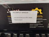 a box with a label on it sitting on top of a laptop