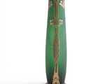 a green vase with gold decoration on it on a white background
