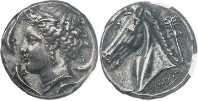 a silver coin with an image of a woman and a bird on it