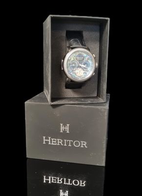 a watch that is in a box on a table