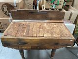 a wooden table that has been made out of wood
