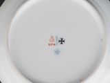 an image of a white plate with a cross on it