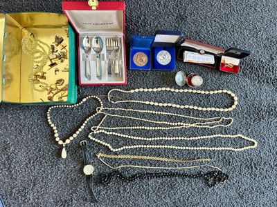 many items that are laying out on the floor