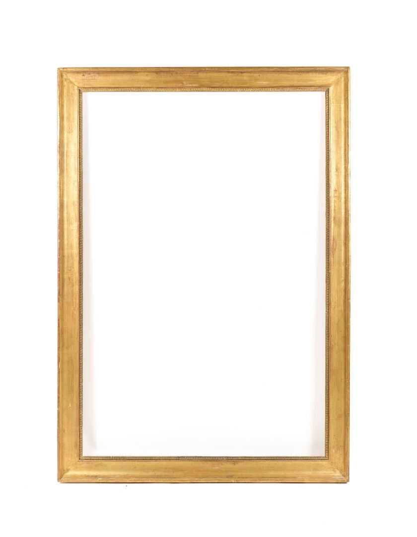 Grande moulure en bois et pâte doré à décor de palmettes, go…