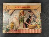an old children ' s book with a picture of a girl and a boy